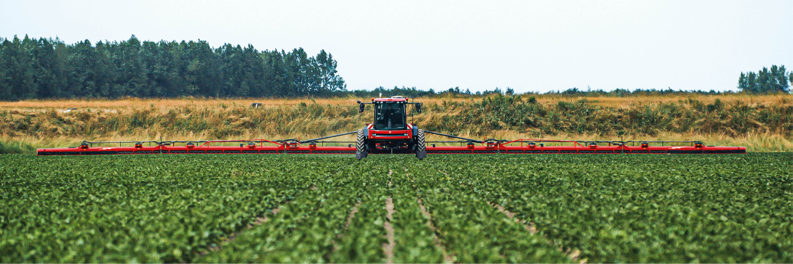 The Agrifac Condor WideTrack solution spraying in the field. Showcasing agricultural solutions for certain crops and fields.
