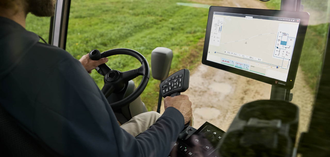 Inside view of the Agrifac cab showing the EcoTronicPlus operating screen.