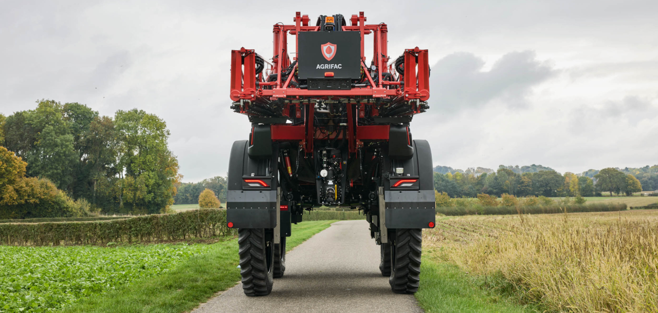 Rear view of the Vanguard 55 driving on the road.