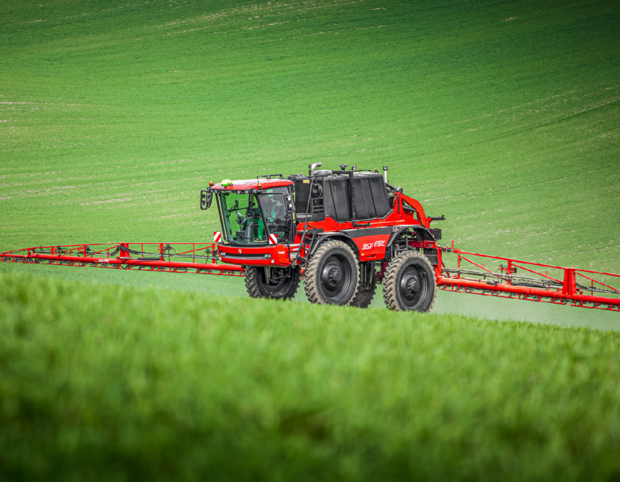 The Agrifac Condor MountainMaster actively spraying in a green field. The machines showcases how it can easily operate in hilly areas.