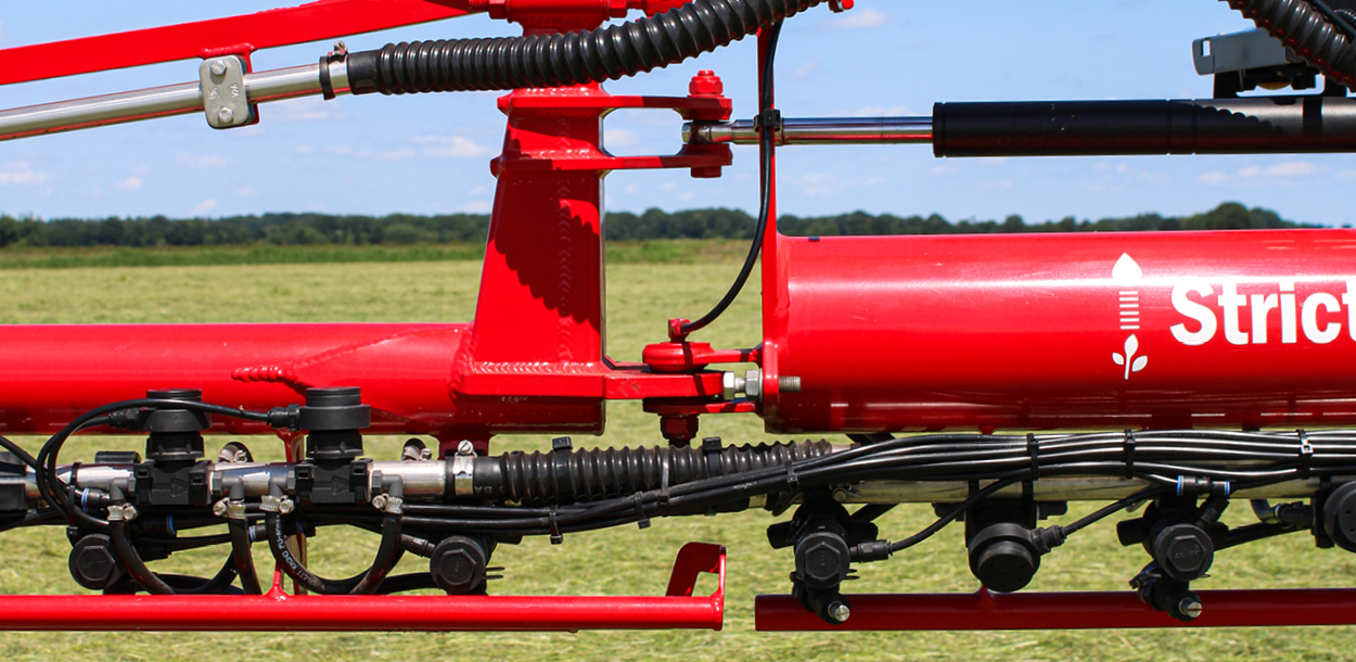 Close up view of a J boom component.