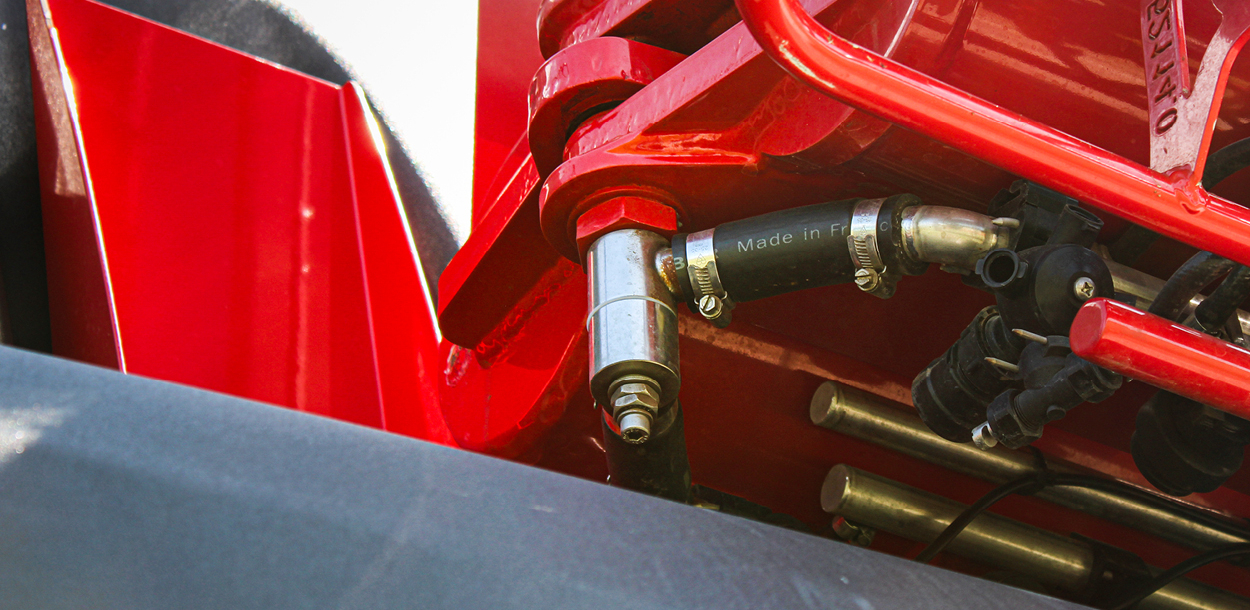 Close up view of a J boom component.