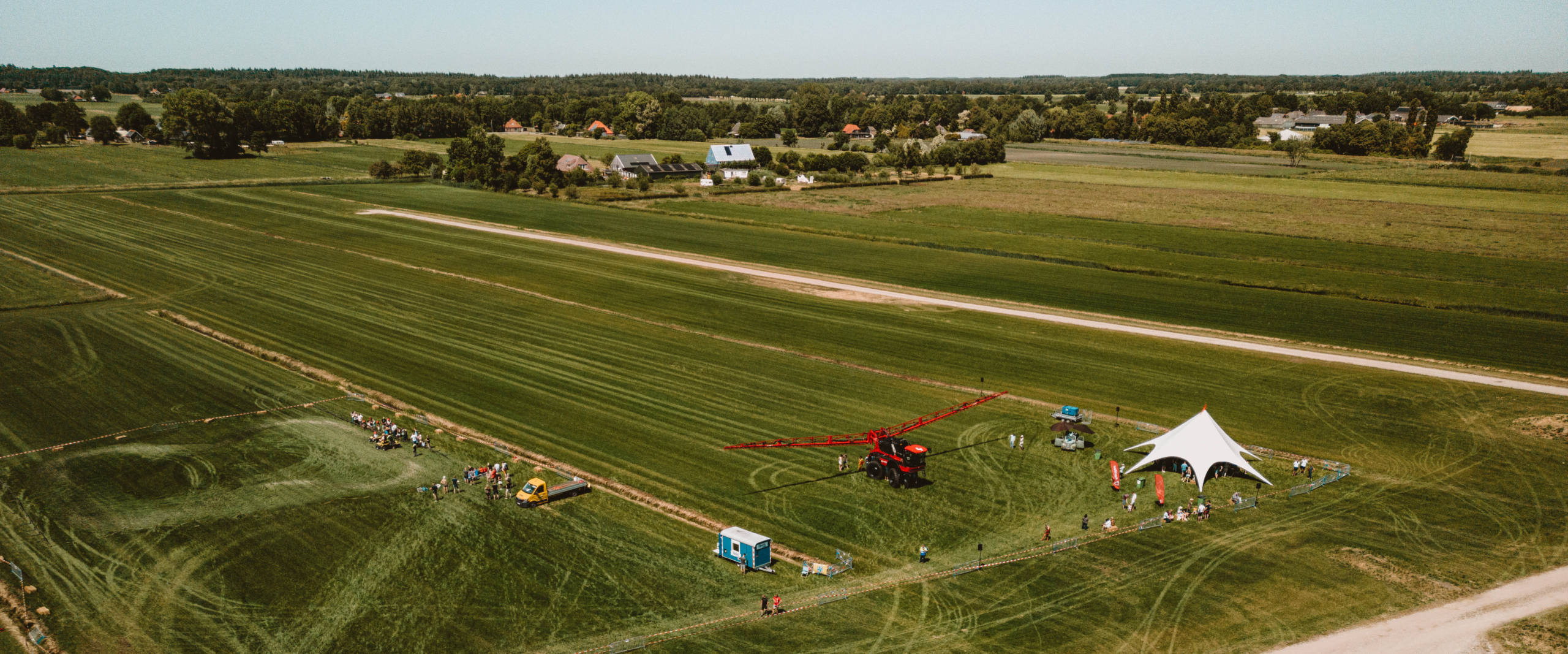 Field demonstration with a sprayer setup.