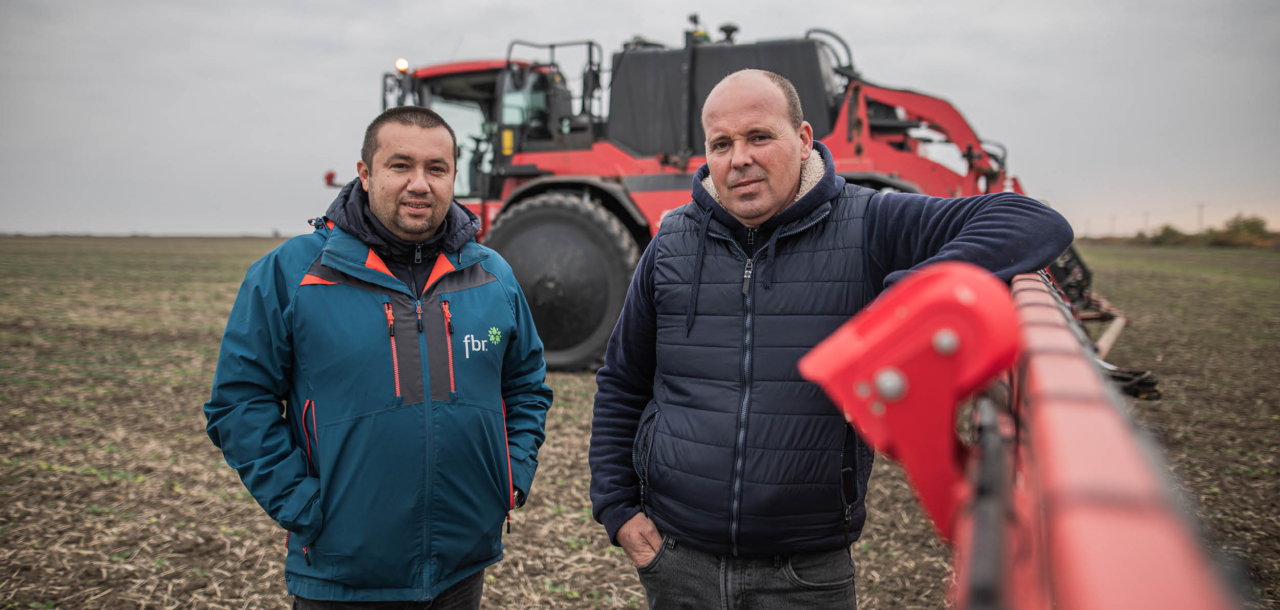 Alexander Degianski and colleague from Forest and Biomass Romania standing next to the AICPlus sprayer.